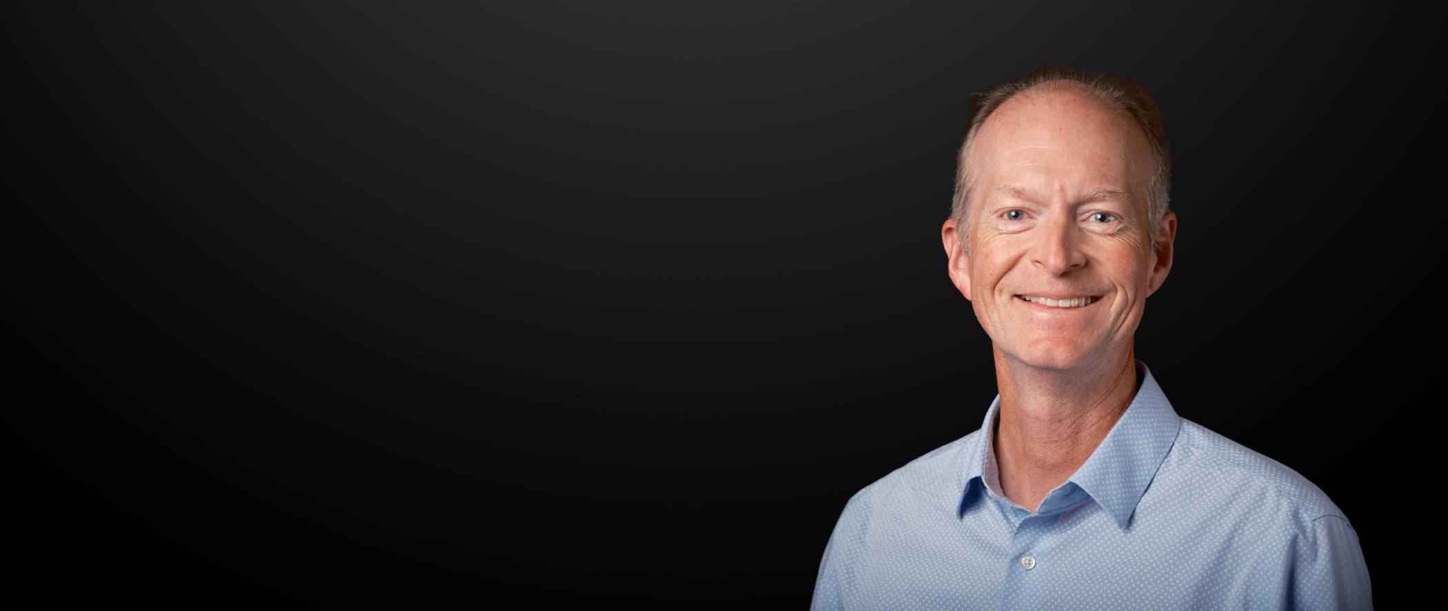 Scott Hogg Headshot on black background